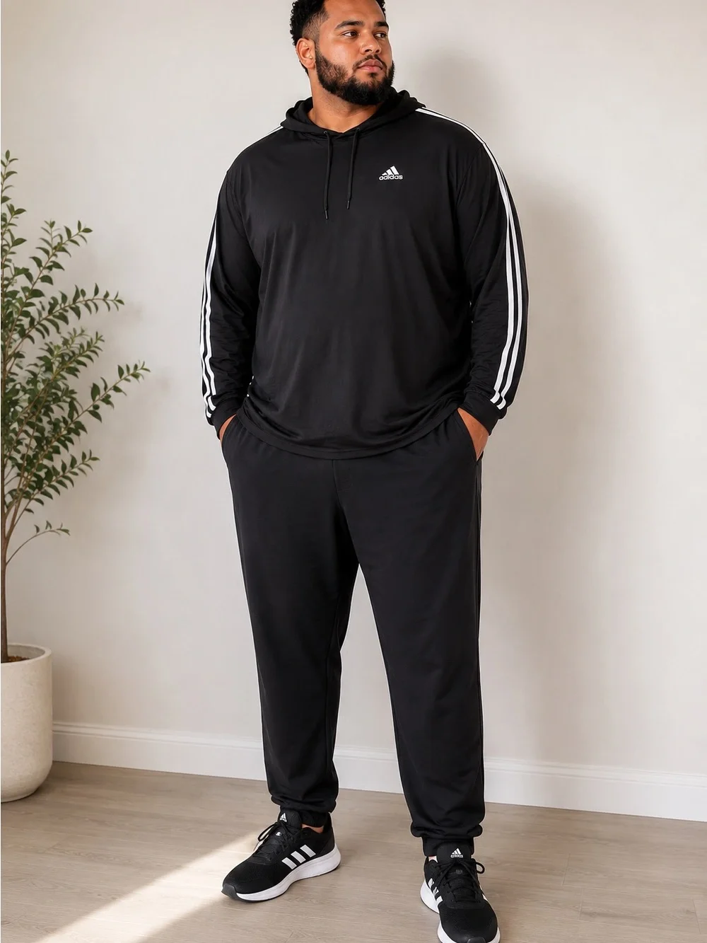 Adidas Black Hoodie with White Stripe Accents